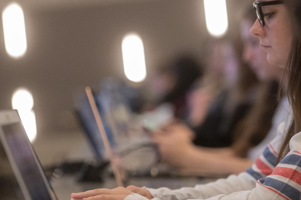 GT students using computers in a classroom.